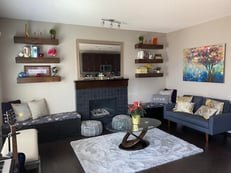 Custom floating shelves with decor and storage - handyman installation